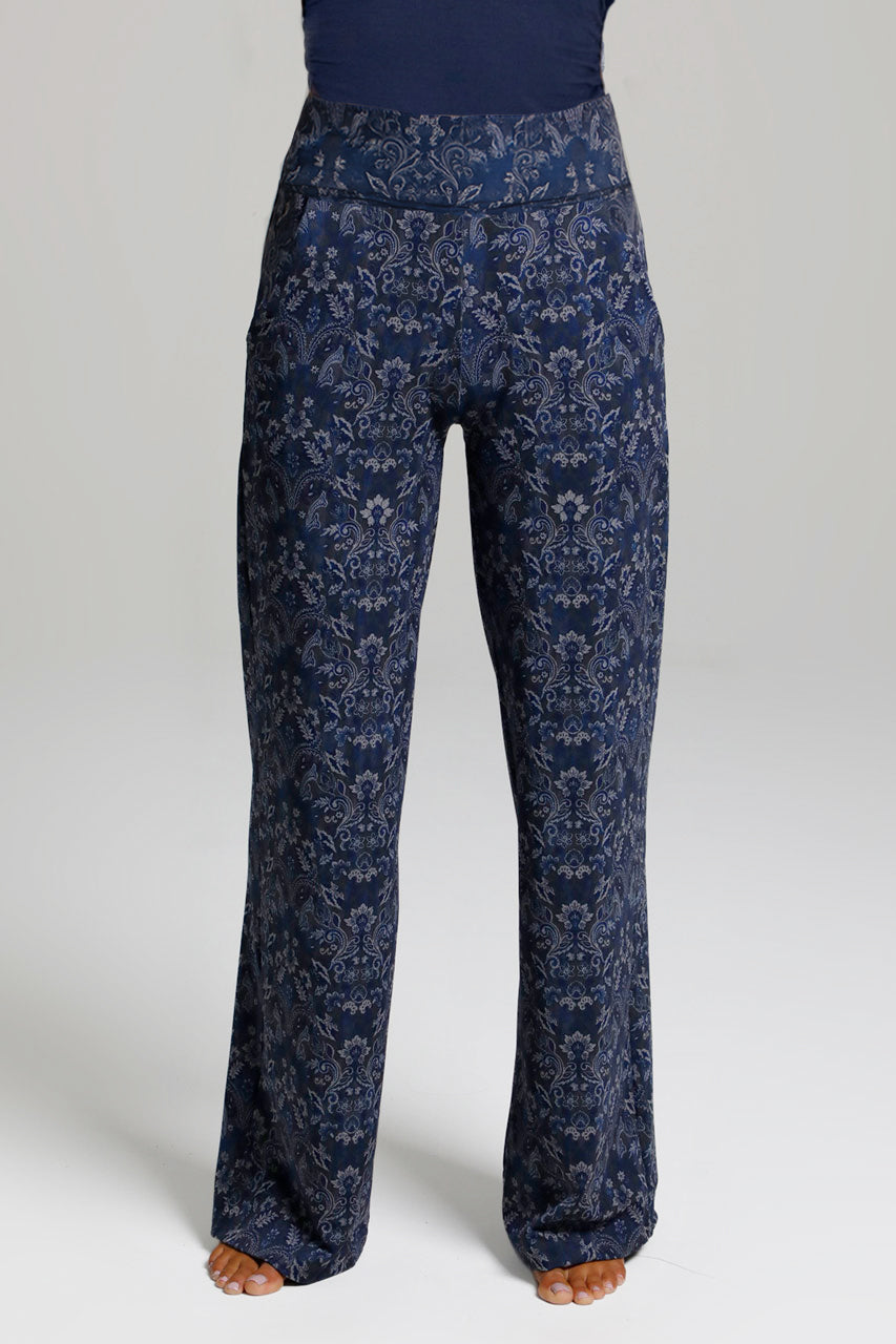 Woman wearing navy medallion high waisted pants