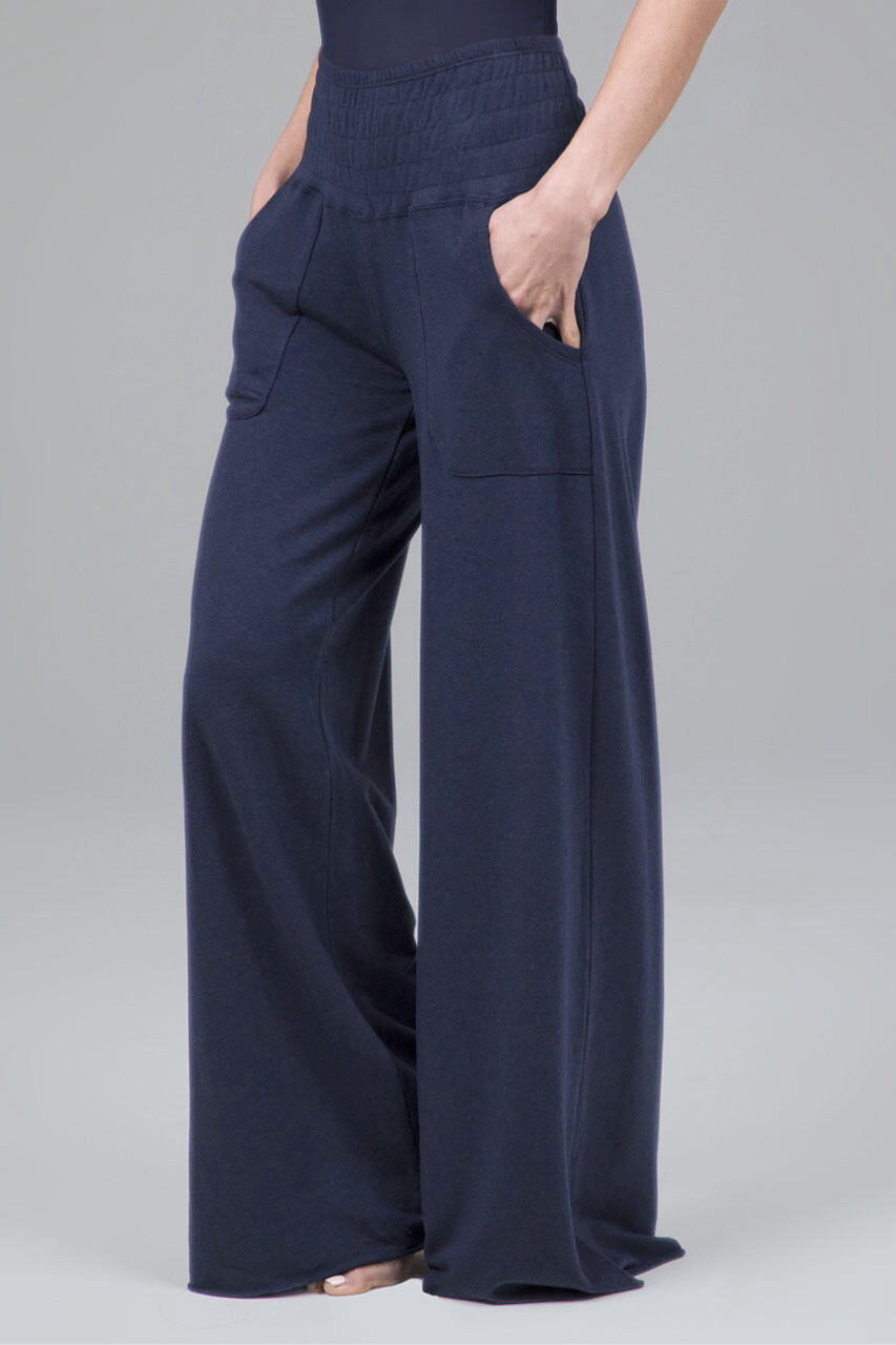 Navy blue wide-leg pants on a plain background
