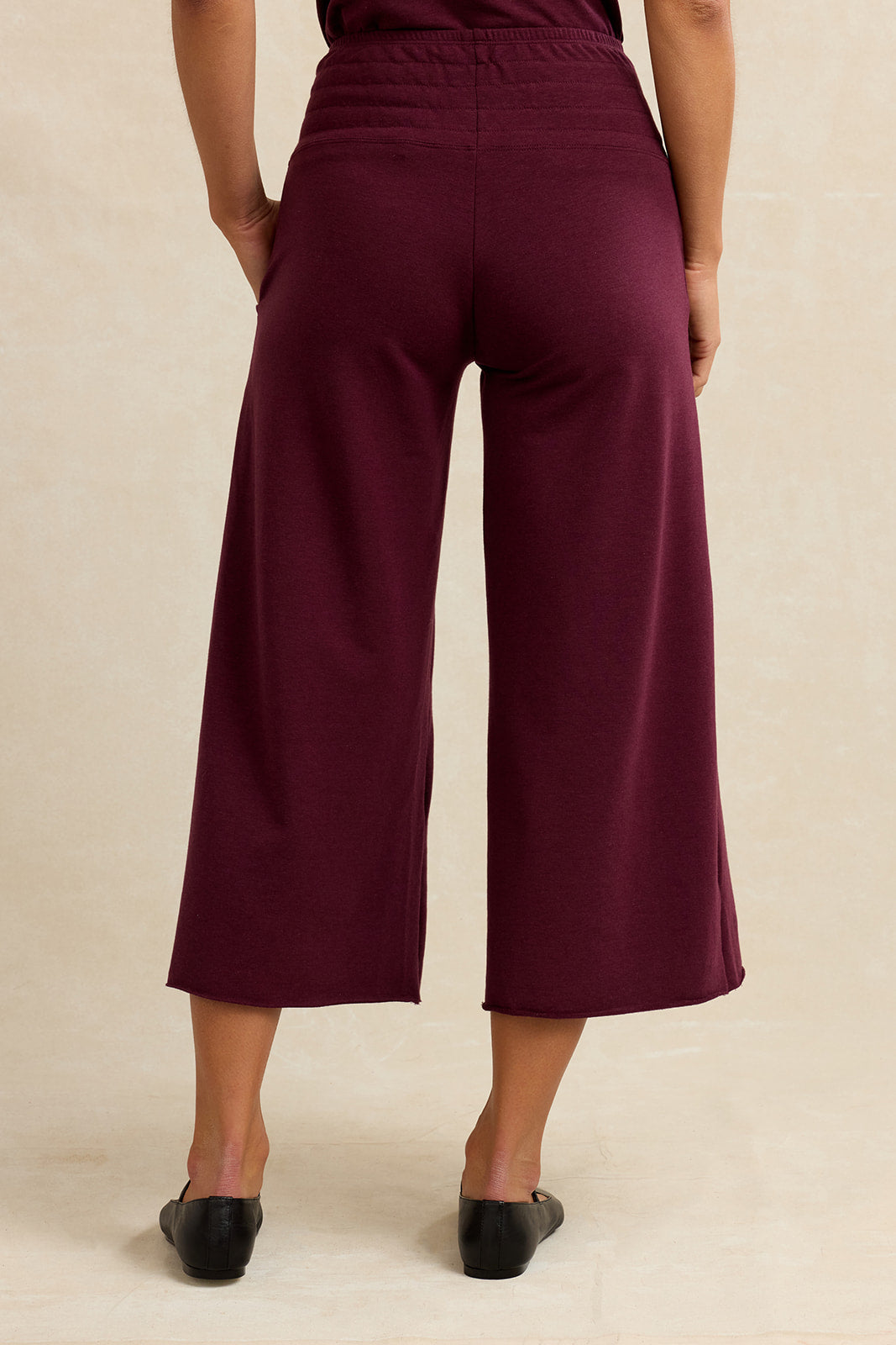 Back view of burgundy lounge cropped pants