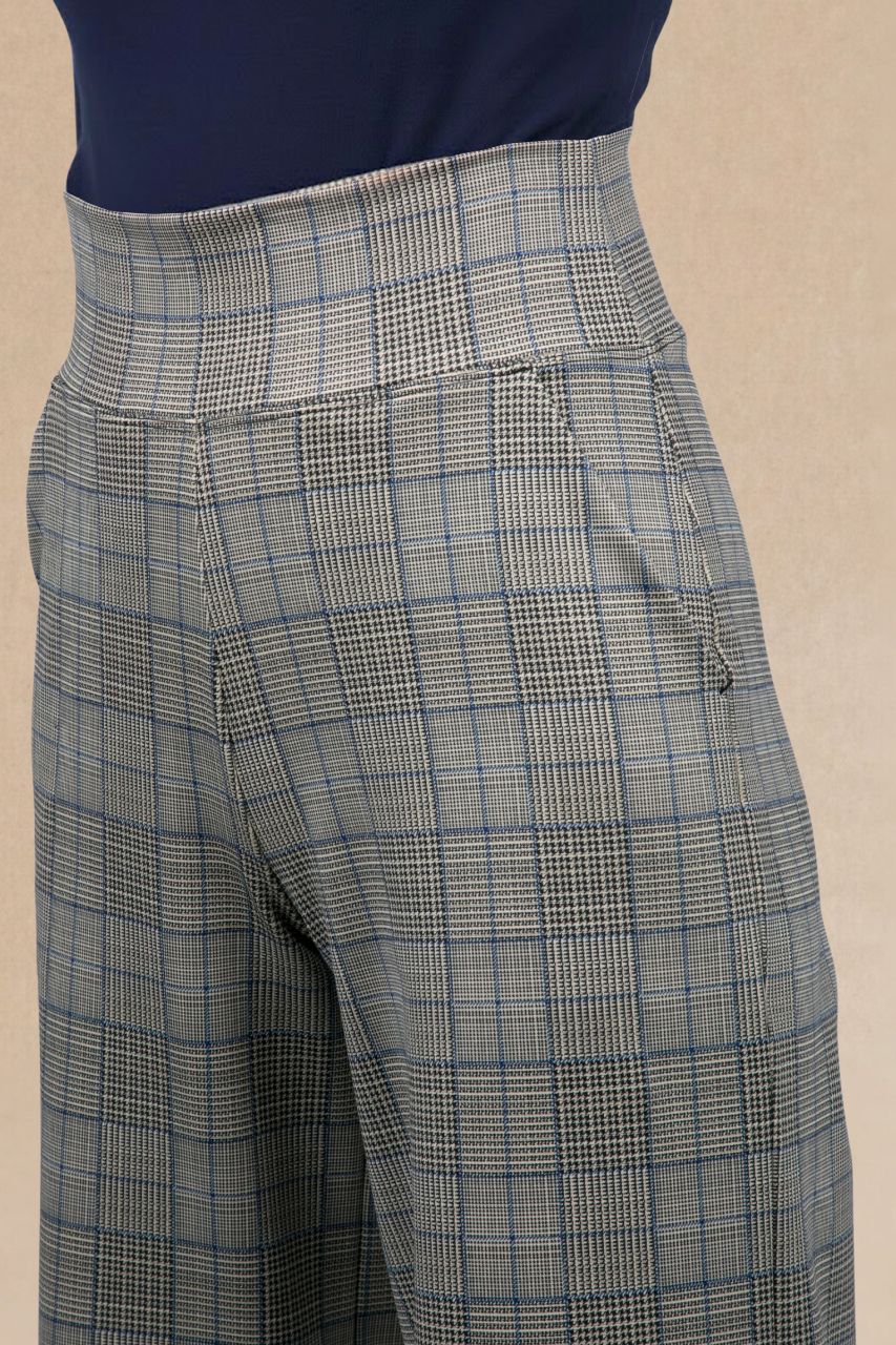 Plaid pants on a beige background