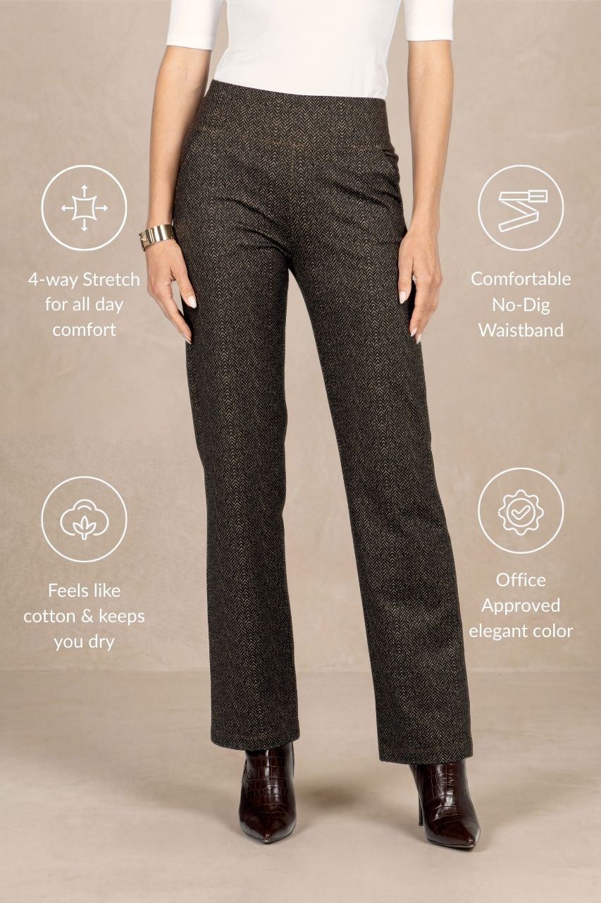 Woman wearing brown herringbone pants with text highlighting features on a beige background