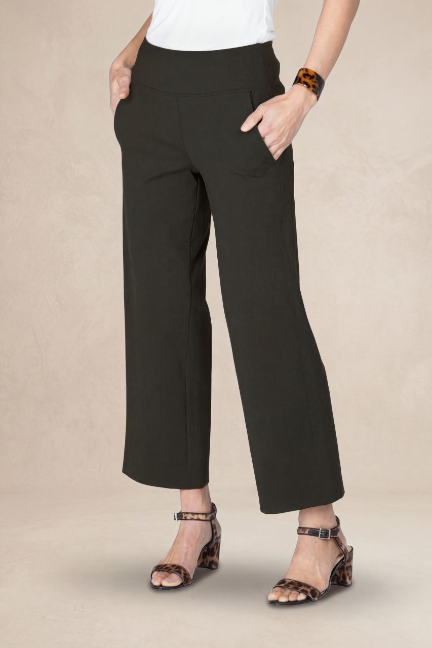 Person wearing forst night pants on a beige background