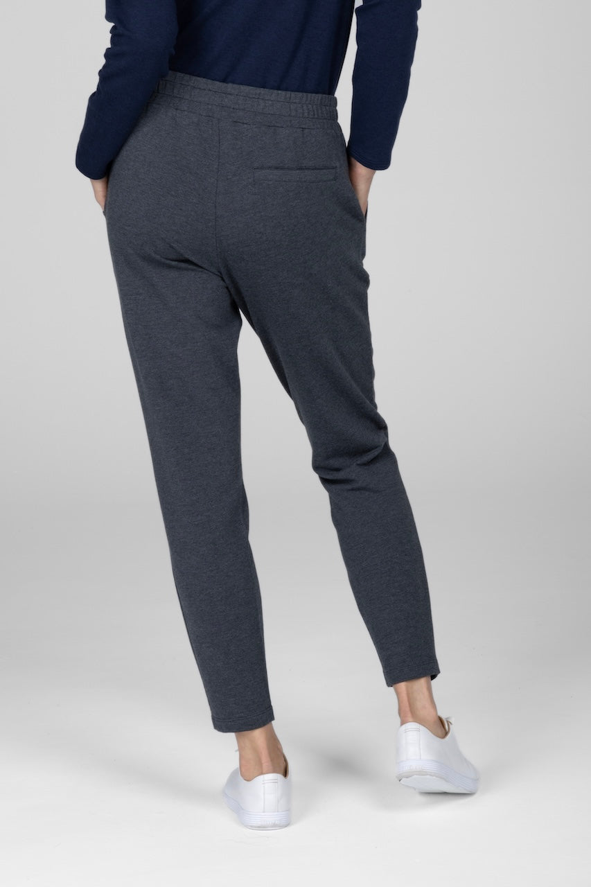 Back view of woman wearing charcoal heather joggers