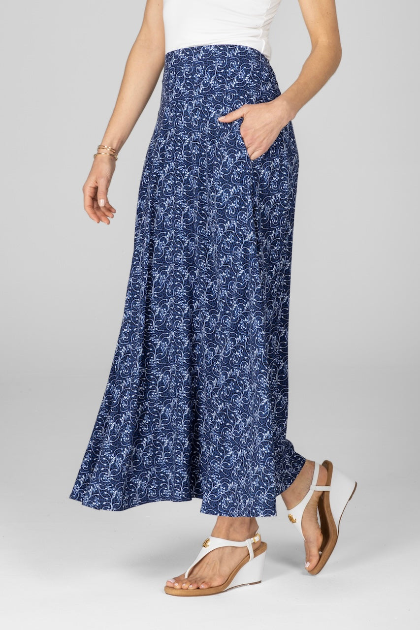 Woman wearing blue vines printed maxi skirt