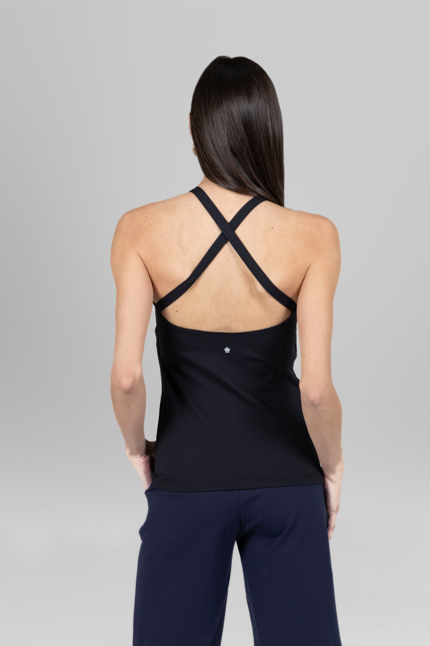 Back view of a black yoga tank top with cross back straps