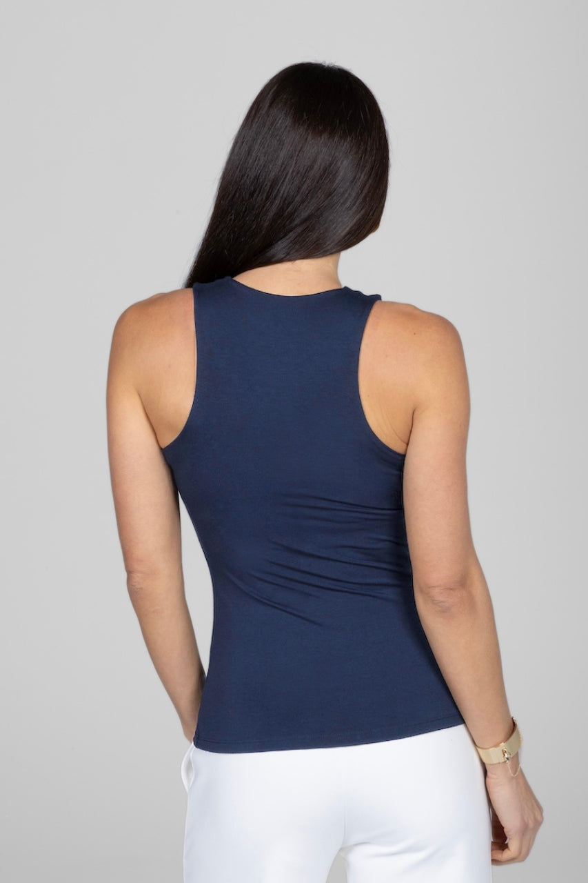 Back view of woman wearing navy tank top