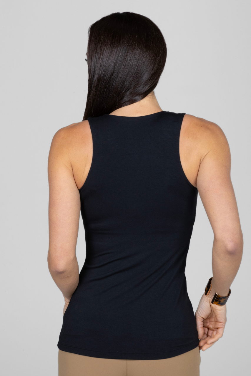 Back view of woman wearing black tank top