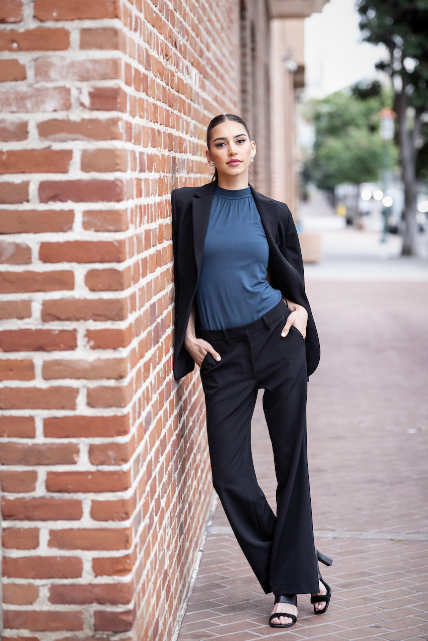 Fulll length outfit of woman wearing black Hailey Blazer and matching Hailey trousers