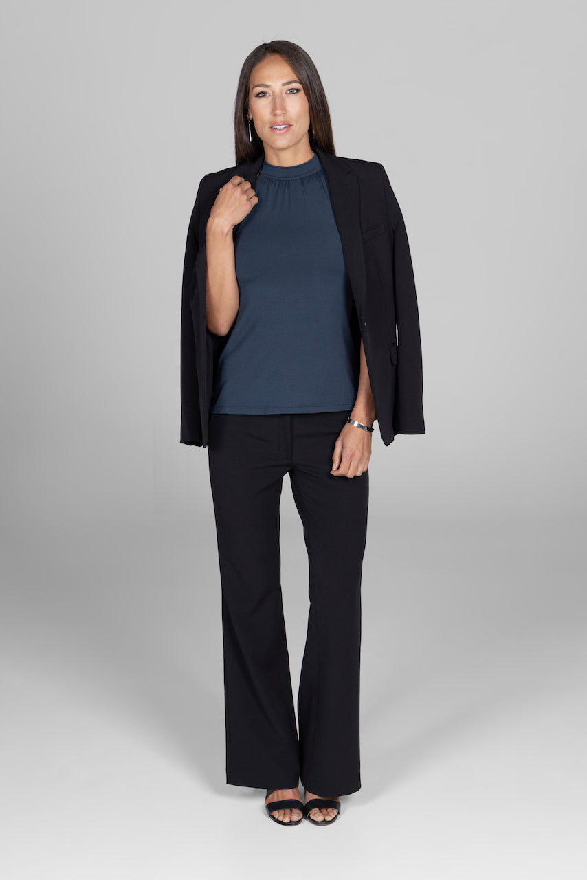 Full length photo of woman wearing black Hailey Blazer with matching black Hailey trousers