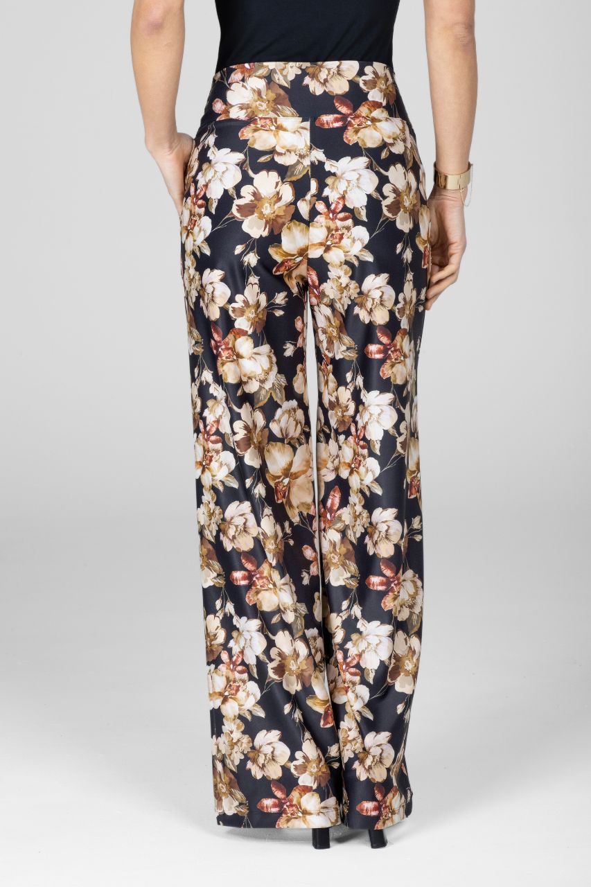 Back view of floral patterned pants worn by a woman