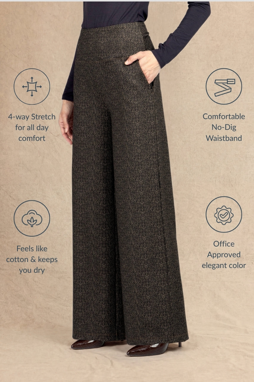 A model wears dark brown textured wide-leg trousers with a no-dig waistband and side pockets, shown against a beige background with feature callout icons.