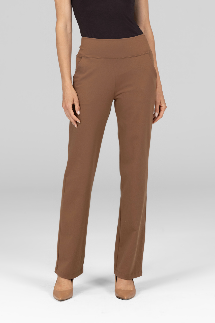 Nina Straight Leg Pants in the color dark khaki worn by a woman