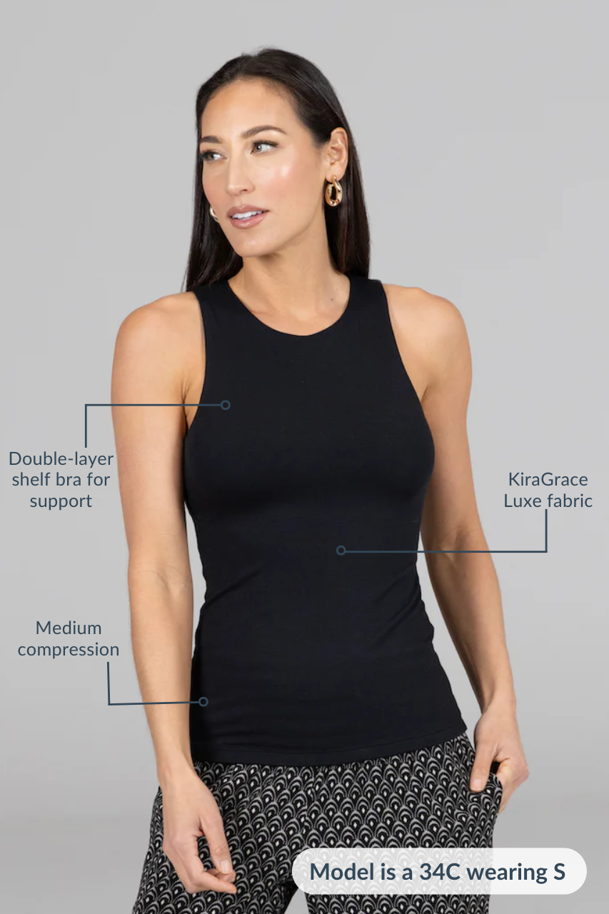 This image features the "TRAVEL TANK: BLACK," a sleek and comfortable women's tank top. The model is shown wearing a black, sleeveless tank top.