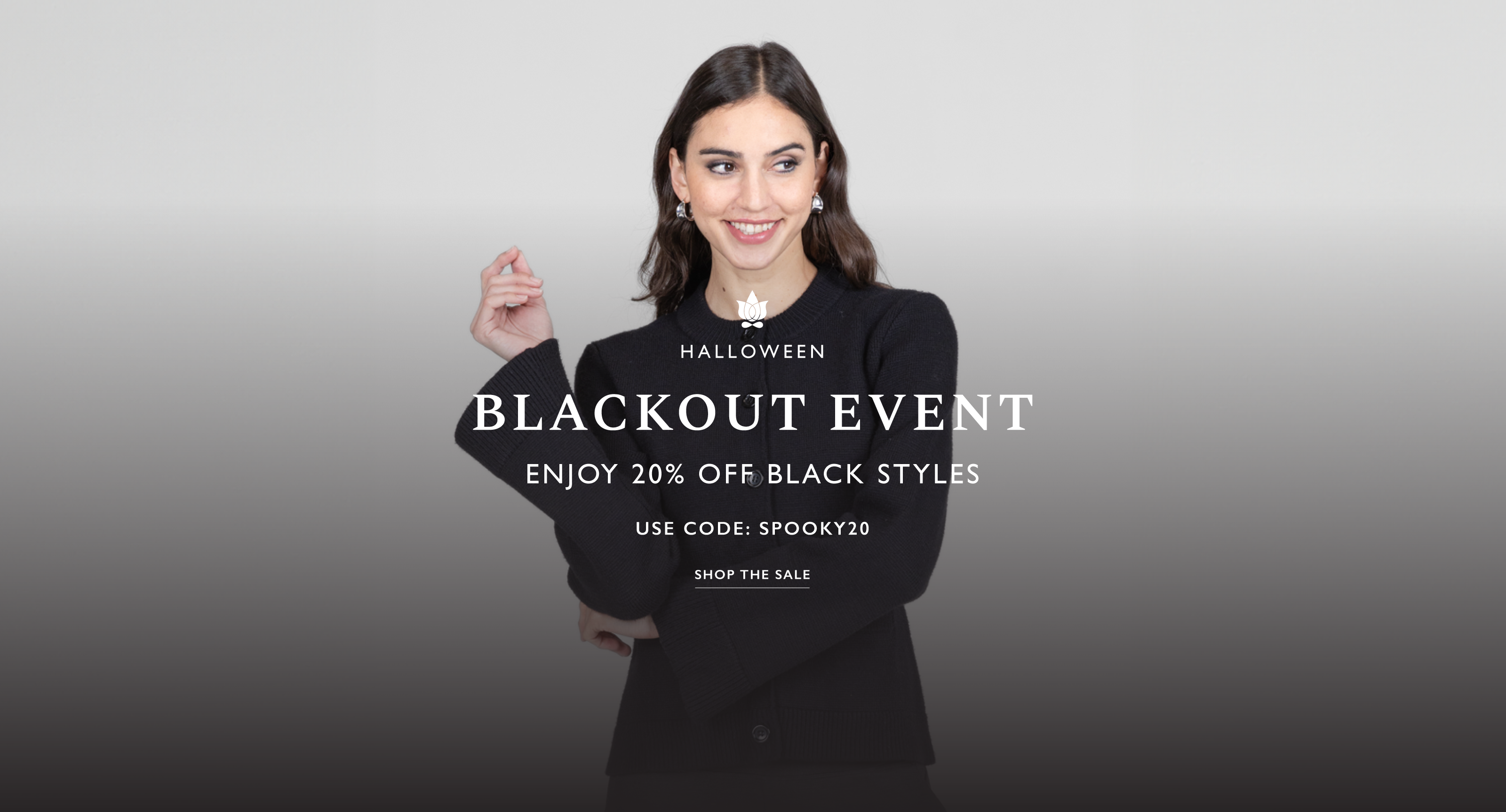Woman wearing a black outfit with Halloween Blackout Event text overlay for 20% off select black styles