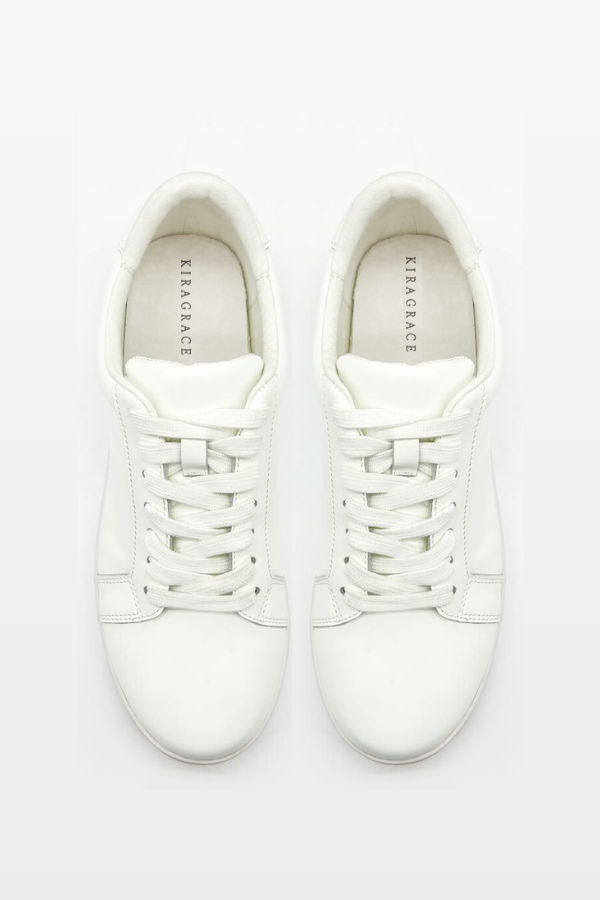 A pair of white Kiragrace sneakers with lace-up closure, displayed against a white background.