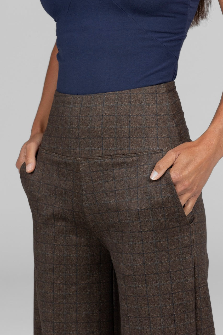 Close-up of the Heritage Plaid pattern on the High Waist Wide Leg Pant, highlighting the intricate details and texture.