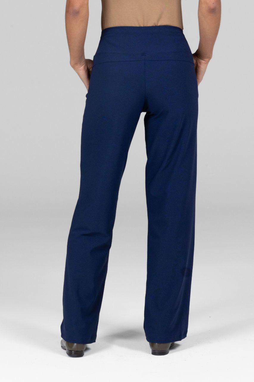 Navy blue pants worn by a person on a white background