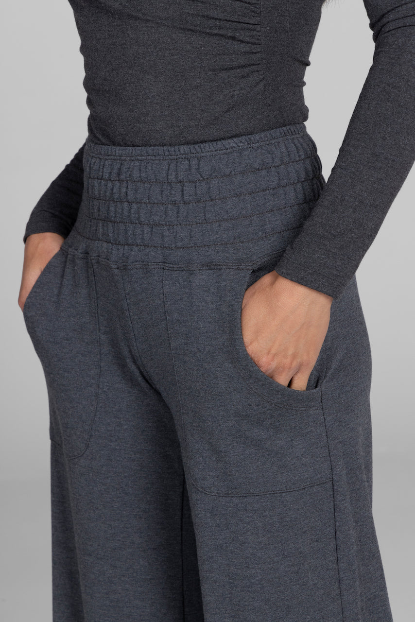 Close-up of the KiraGrace Cozy Boho Yoga Pant in charcoal heather, showcasing the detailed stitching and luxurious fabric texture