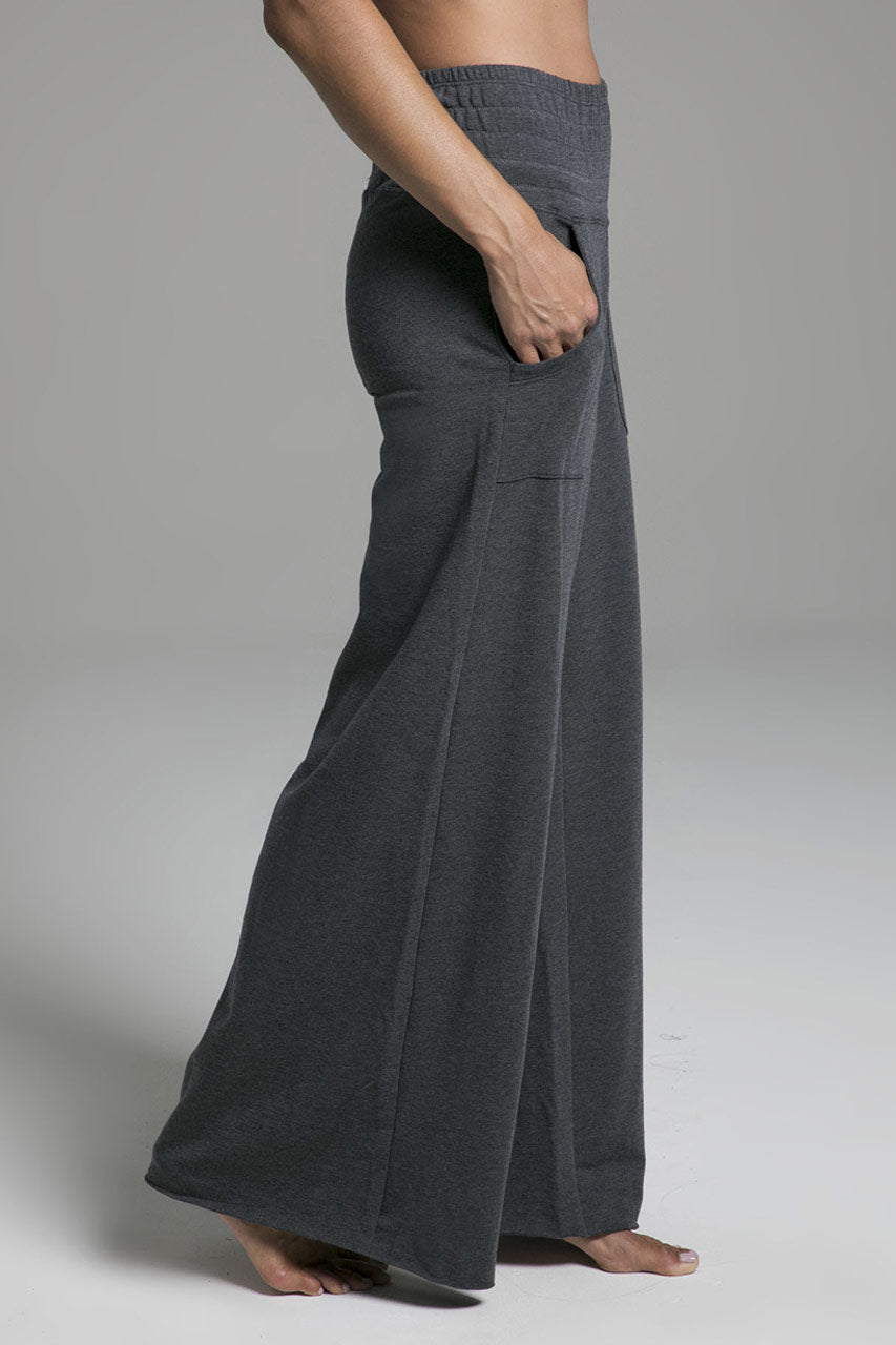 Side view of the Cozy Boho Yoga Pant in charcoal grey, highlighting the relaxed fit and flowing silhouette for a laid-back yet chic style.