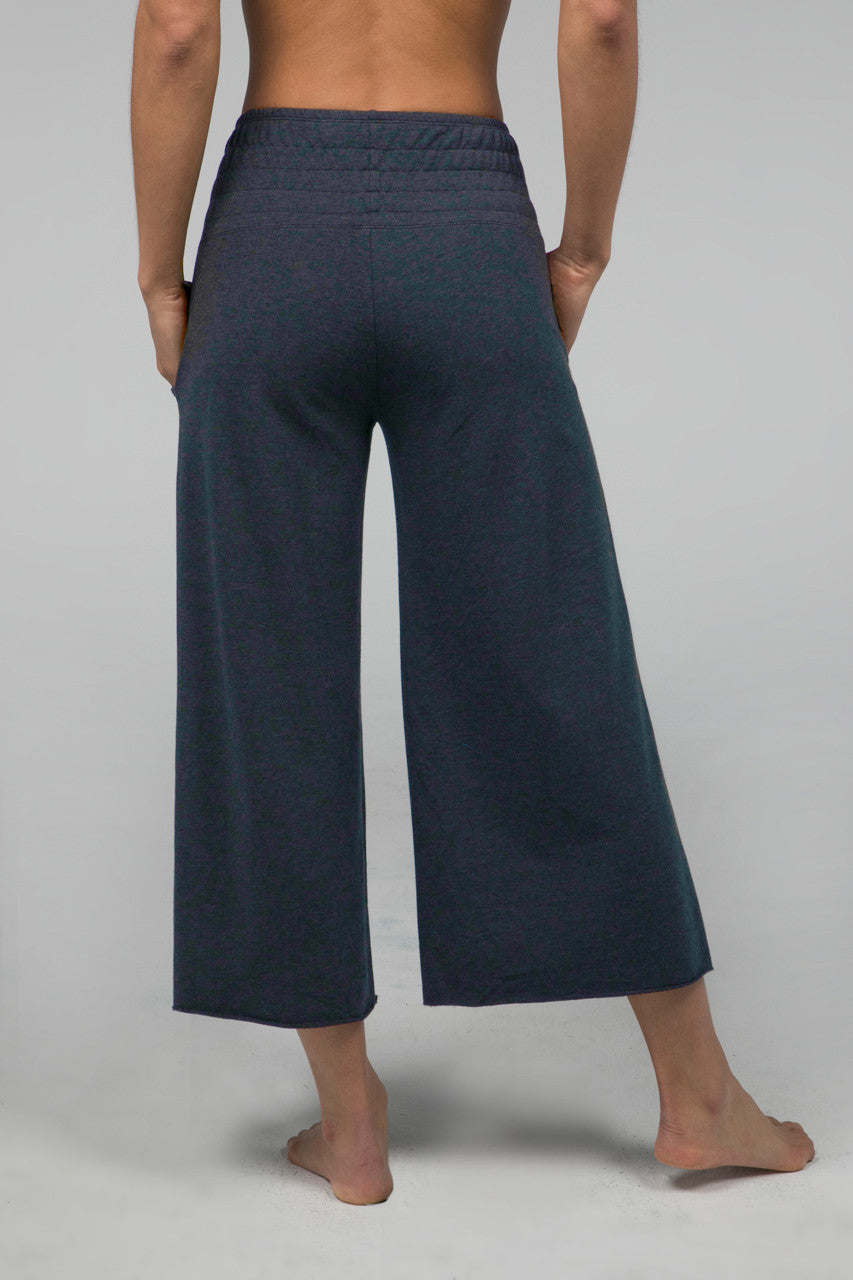 Back view of the KiraGrace Cozy Boho Crop Yoga Pant in heather lake, showcasing the relaxed fit and stylish cropped design