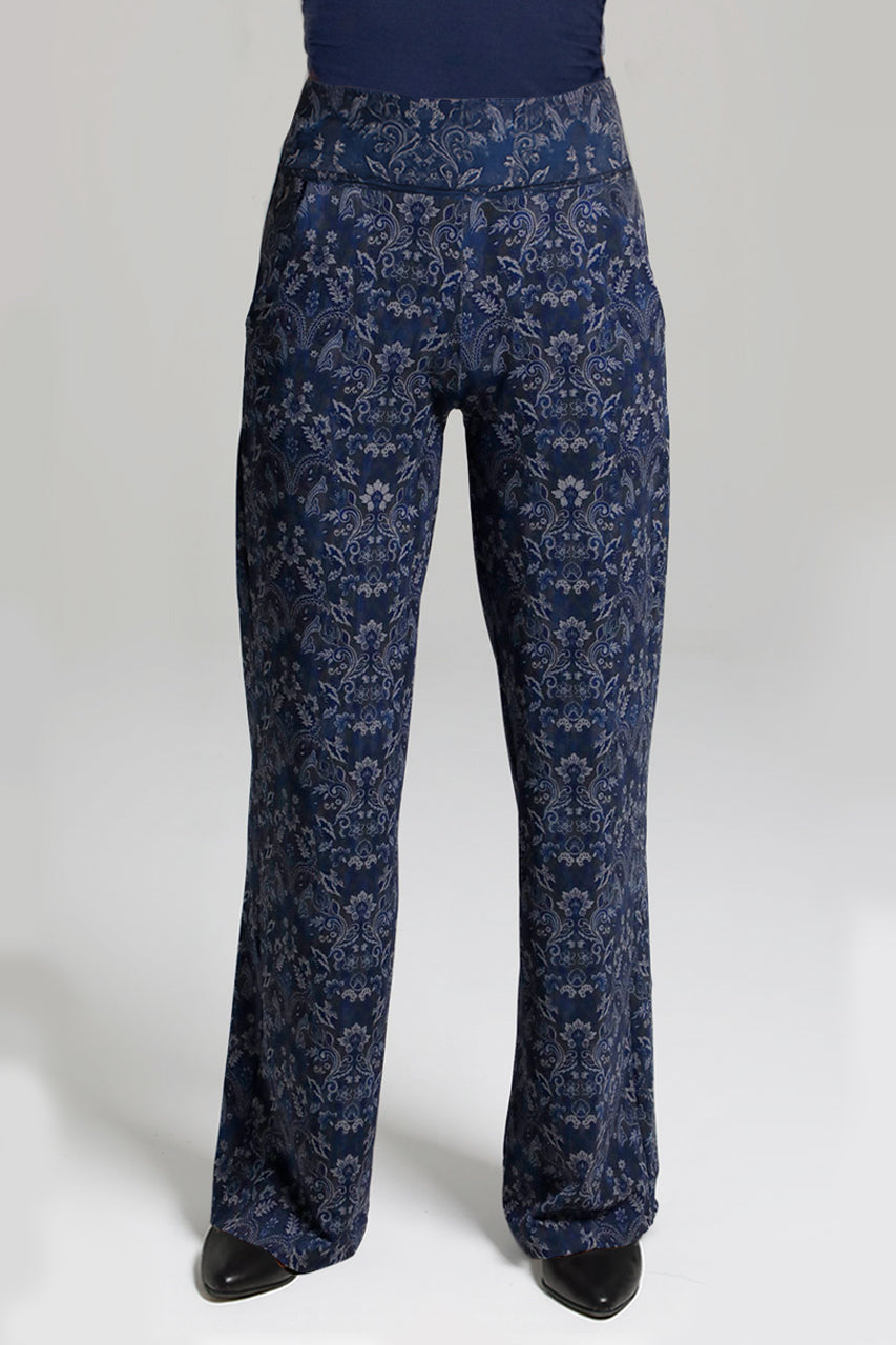 Navy blue patterned pants on a white background