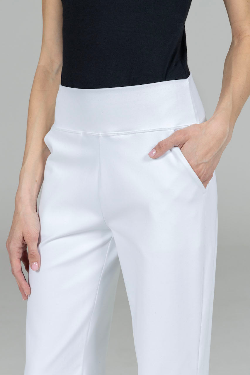 Close-up of the Nina Straight Leg Pant in white, highlighting the luxurious fabric texture and detailed stitching