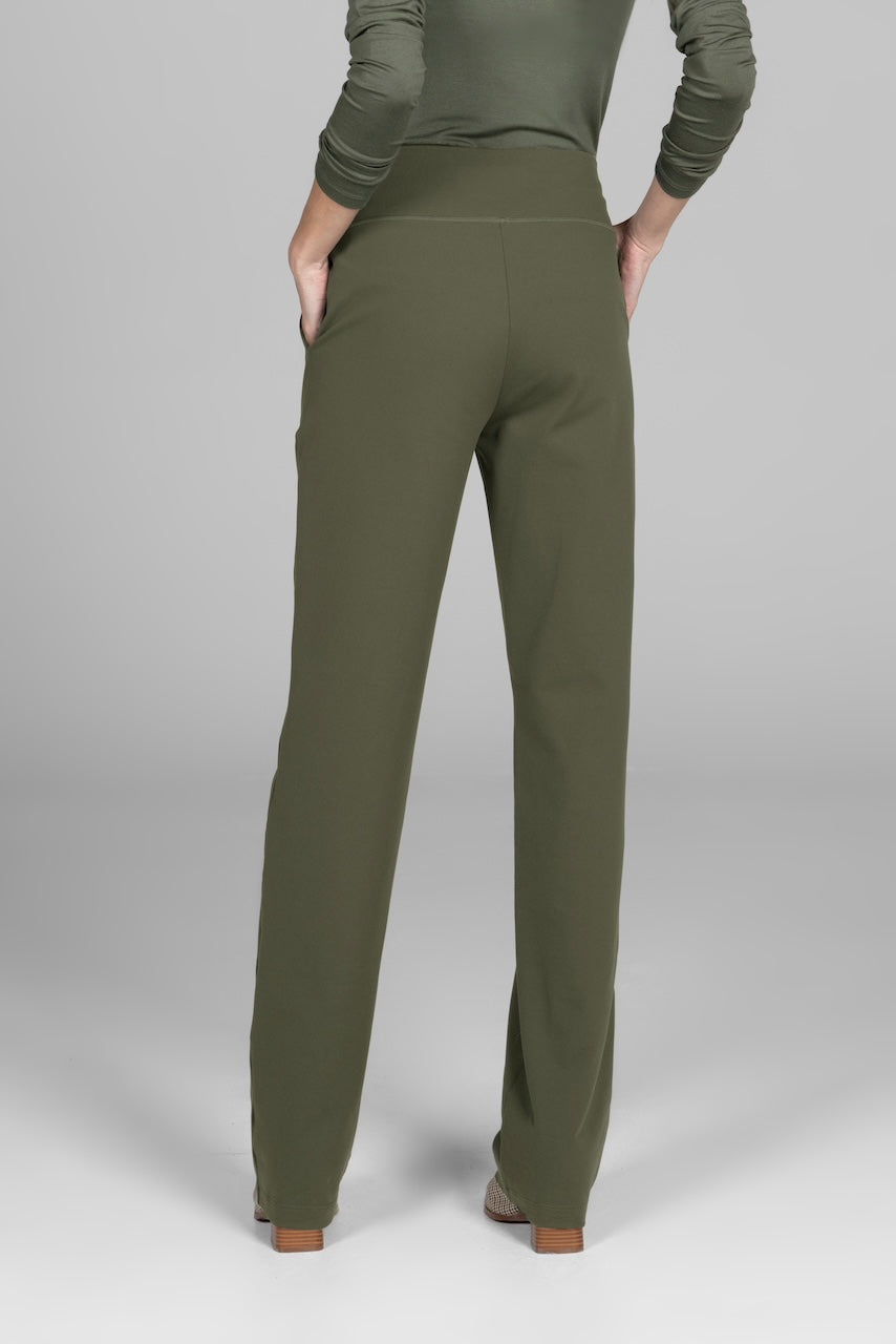 Back view of green high-waisted pants with clean seam details.