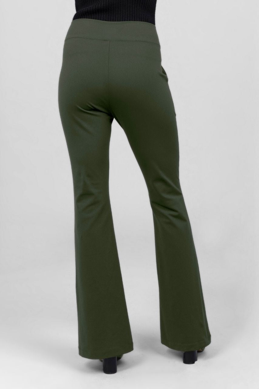 Back view green flared pants on a white background