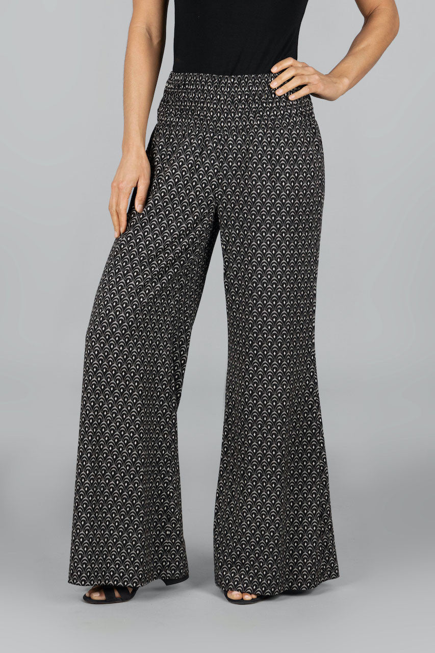 Front view of the Portofino Travel Pant in woodblock print, highlighting the unique pattern and comfortable fit for a stylish and versatile look