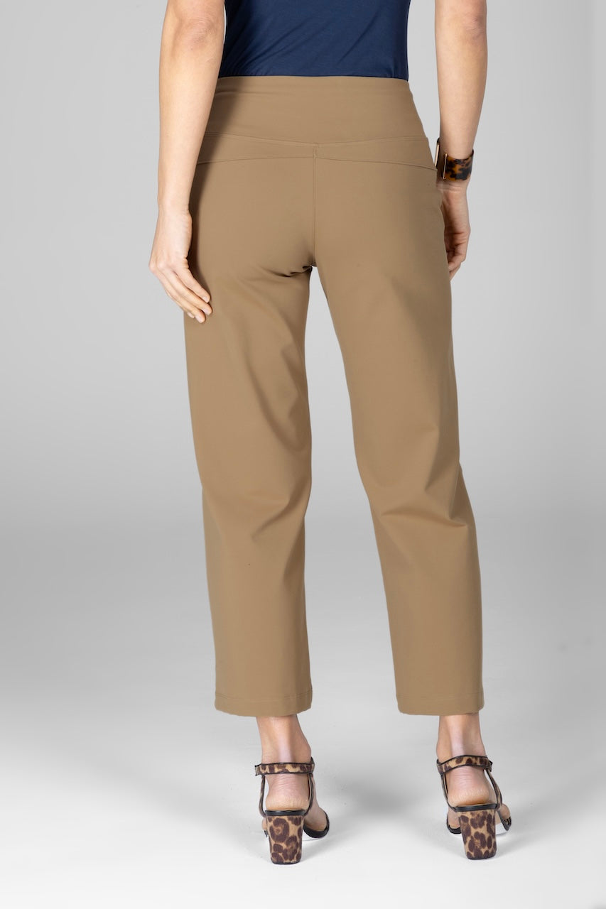 Back view of woman wearing khaki ankle pants