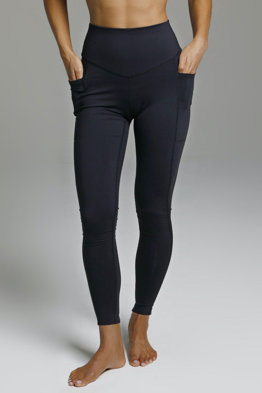 Front view of the Duchess Yoga 7/8 Legging in black, highlighting the stylish design and comfortable fit, perfect for both workouts and casual wear