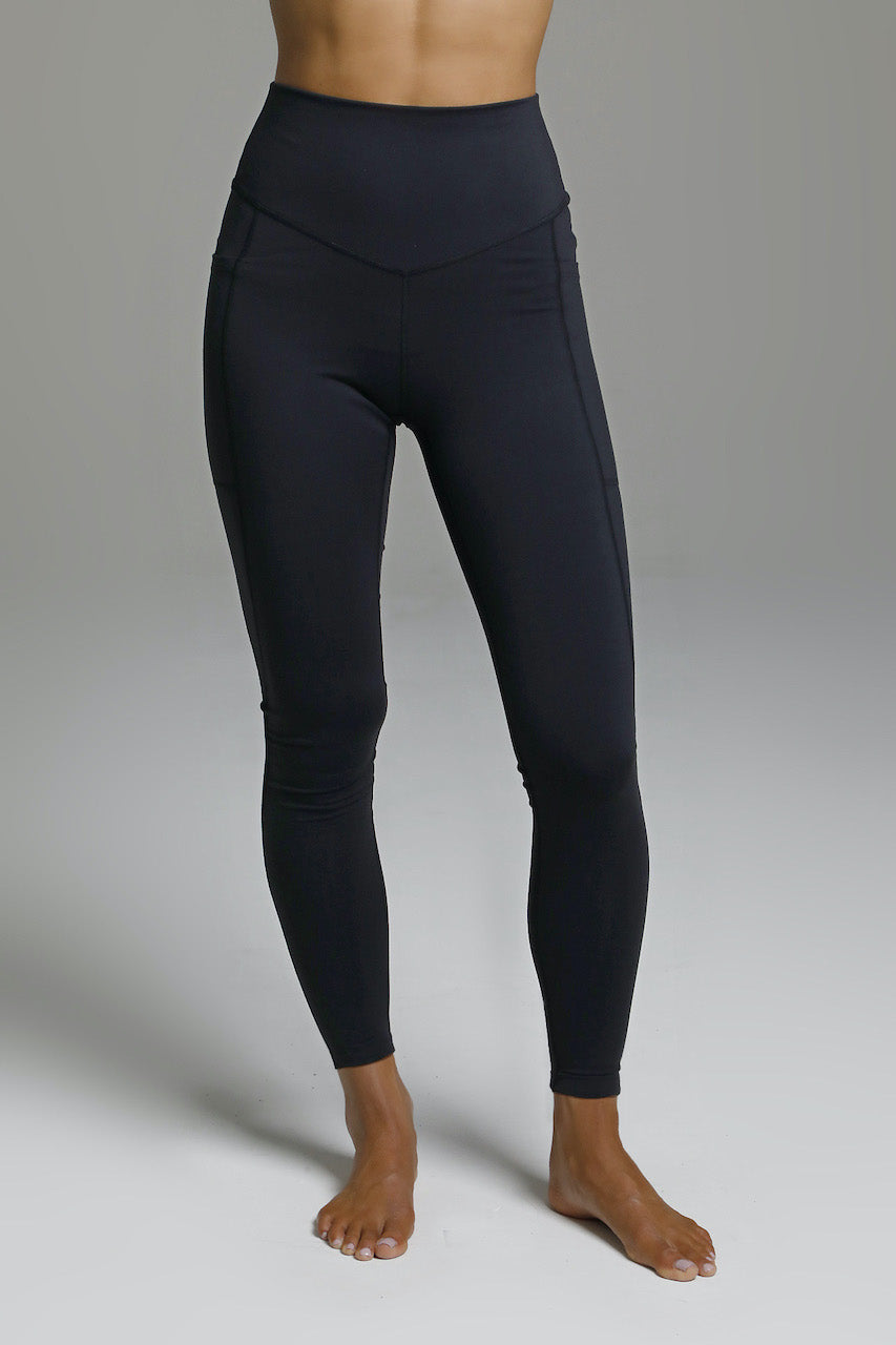 Front view of the Duchess Yoga 7/8 Legging in black, highlighting the stylish design and comfortable fit, perfect for both workouts and casual wear.