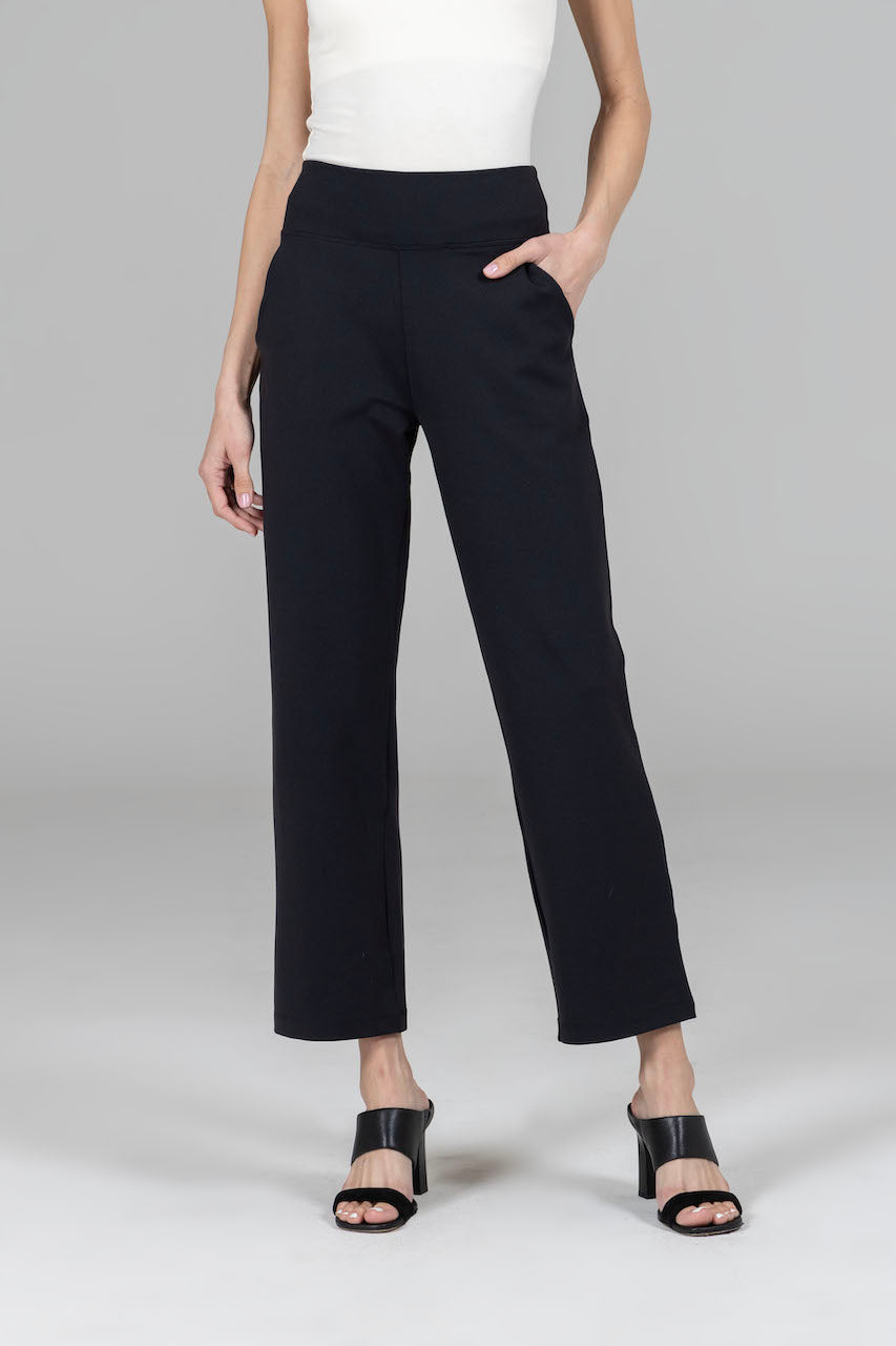 Front view of the Nina Straight Leg Ankle Pant in black, paired with a white top, showcasing a chic and sophisticated outfit perfect for any occasion