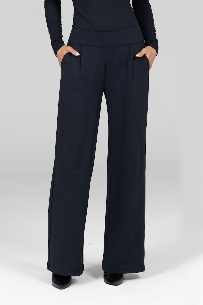 Front view of Monica Pant in black, showcasing the sleek, tailored design and classic black color.