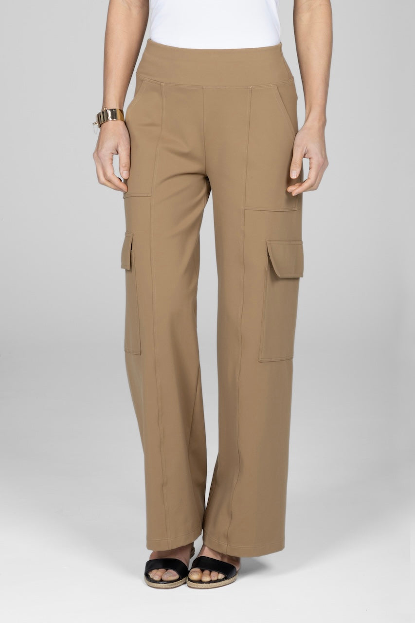 A model wearing khaki wide leg cargo pants with multiple pockets.