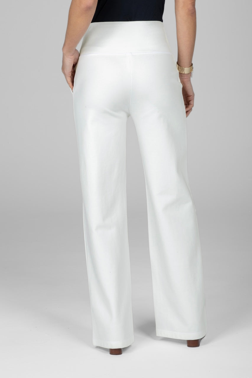 Back view of woman wearing white high waist wide leg pants