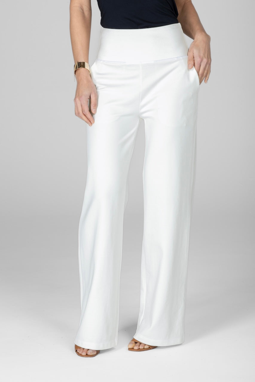 A pair of high-waisted, wide leg ivory ponte pants with a structured waistband.