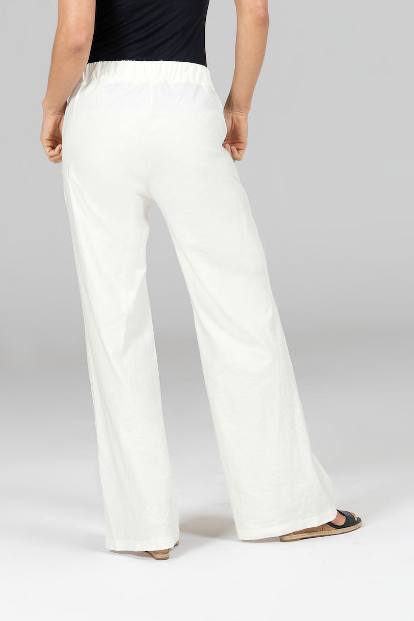 Back view of the Ravello Linen Pant in ivory, highlighting the comfortable fit and elegant design from behind.