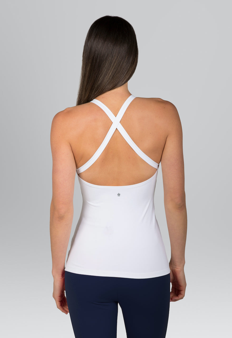 Back view of the Grace Yoga Halter in white, with criss cross straps in the back