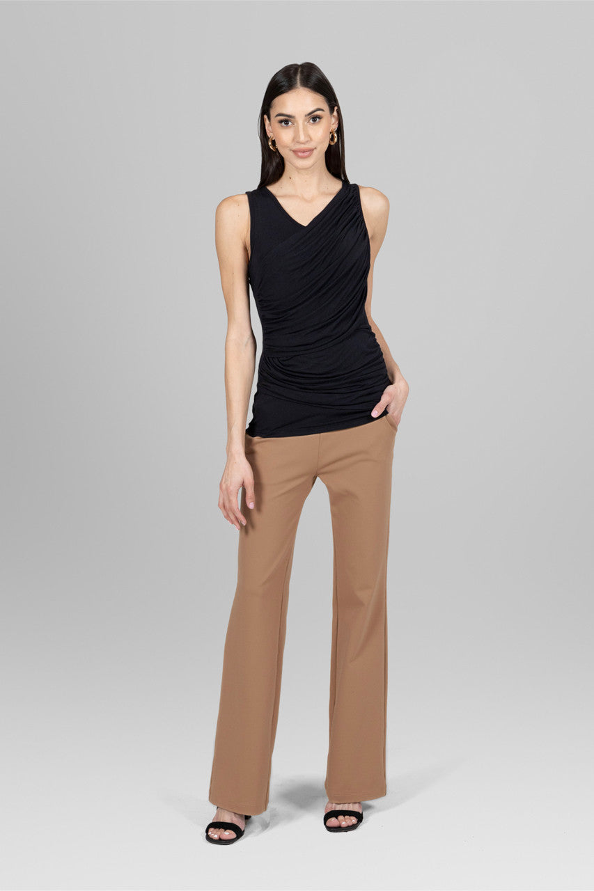 Full outfit featuring the Goddess Ruched Sleeveless Top in black paired with khaki pants, showcasing a chic and polished look perfect for various occasions