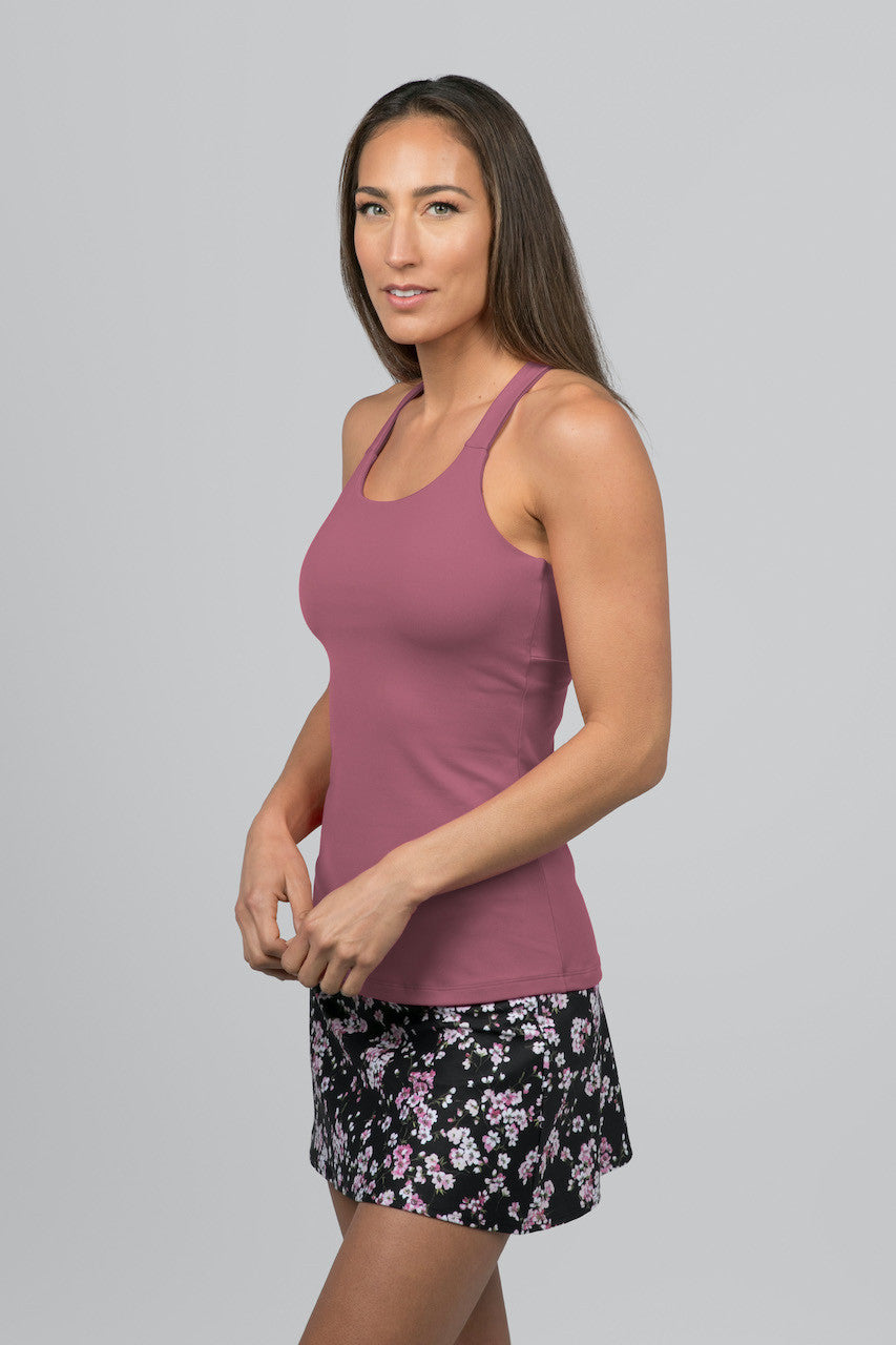 Side view of the Horizon Yoga Tank in Dusty Rose, highlighting the flattering fit and stylish design that offers comfort and elegance for any activity.