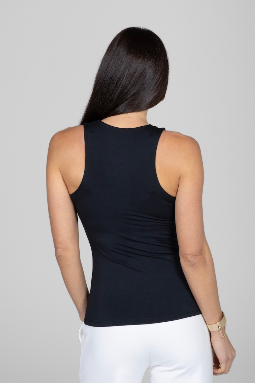 Back view of woman wearing black tank top