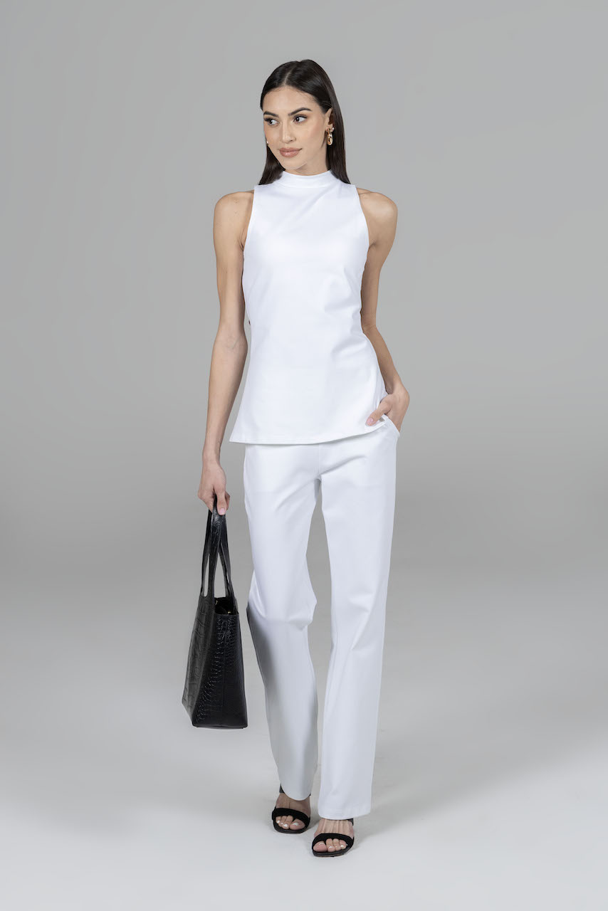 Full outfit featuring a white top paired with the Nina Straight Leg Pant in white, showcasing a chic and monochromatic look that's effortlessly stylish