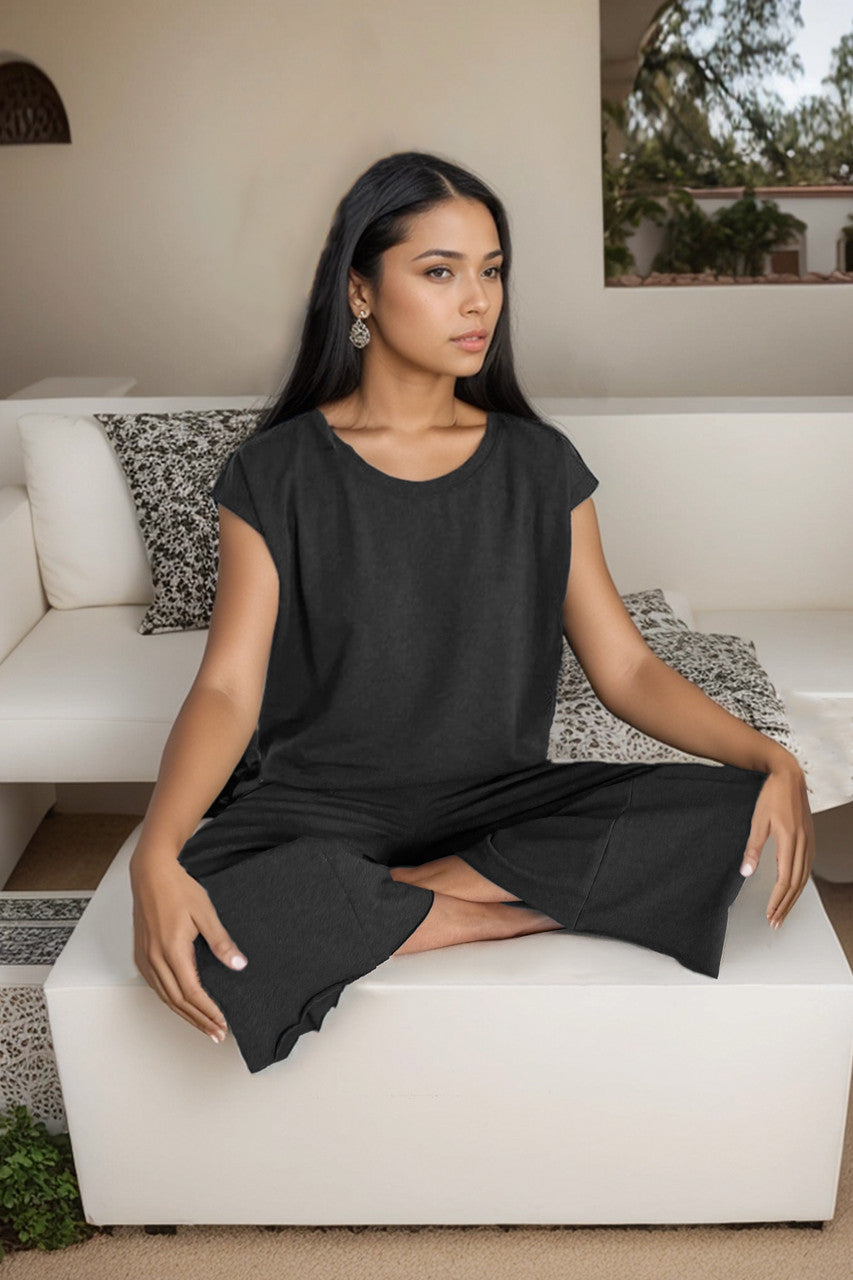 Model sitting in BOHO DOLMAN TOP: CHARCOAL HEATHER