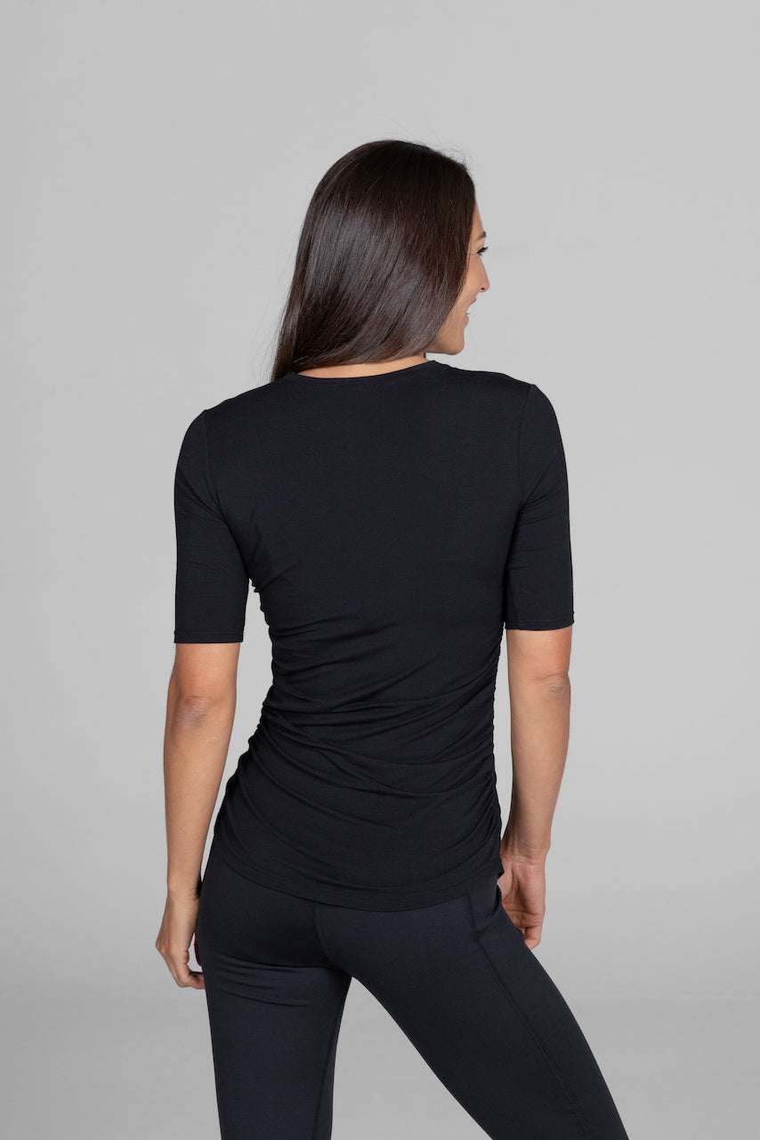 Back view of the Ruched Elbow Sleeve Tee in black, highlighting the design and fit from the rear.