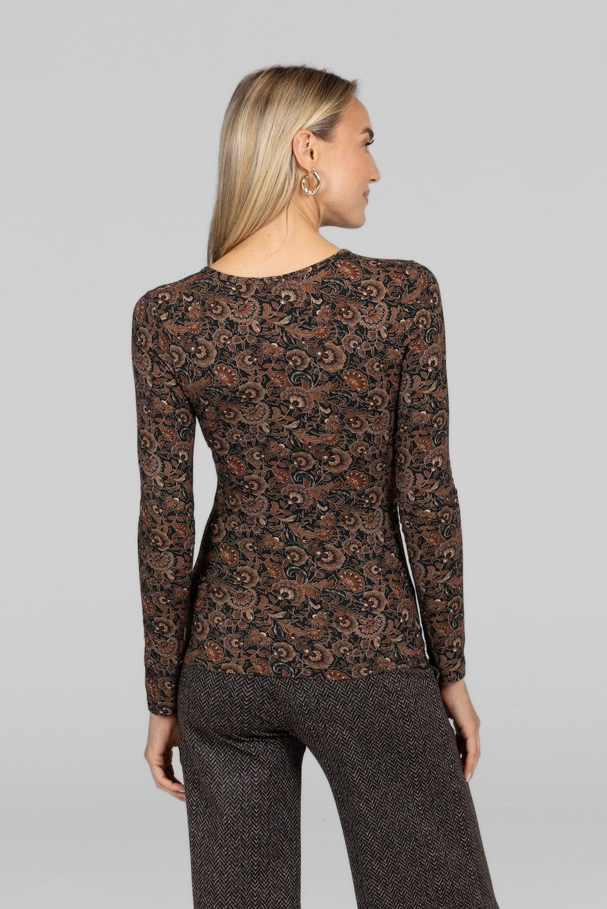 Back view of the amber floral Ruched Wrap Top, highlighting the flattering wrap design.