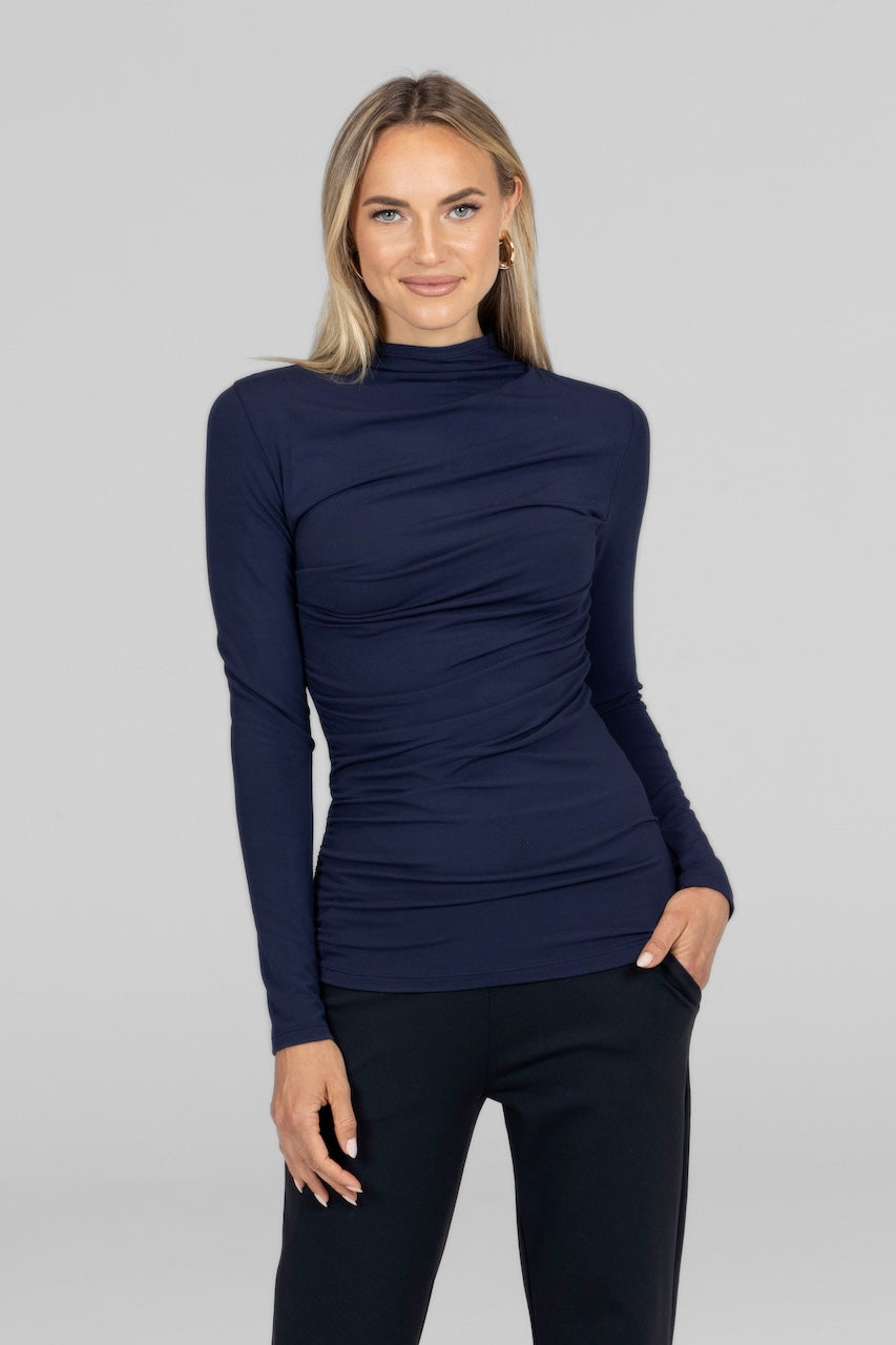 Front view of Luxe Draped Long Sleeve in marine navy, highlighting the elegant draped design and deep navy color.