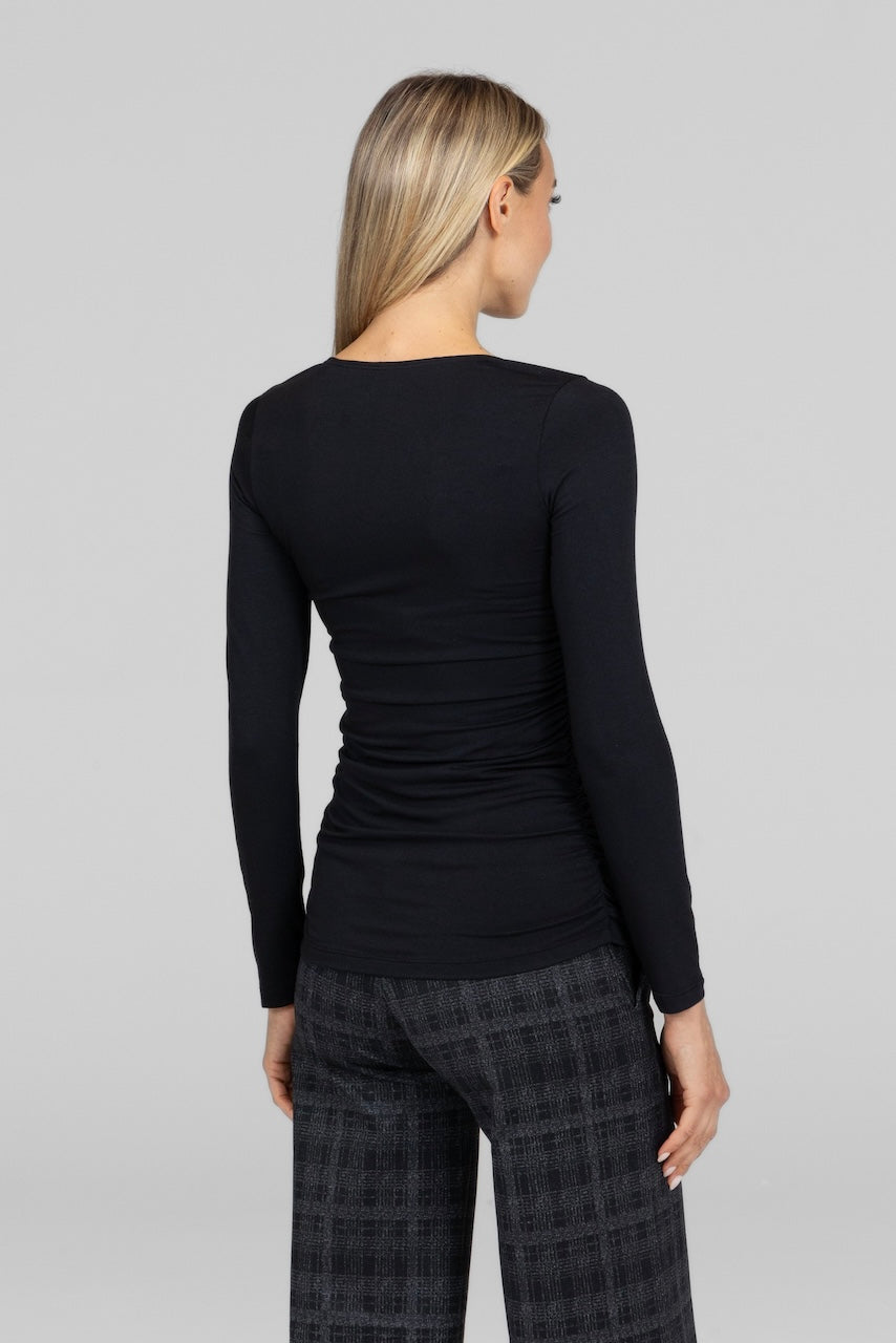 Back view of black Square Neck Long Sleeve Top, highlighting the clean lines and fitted design.