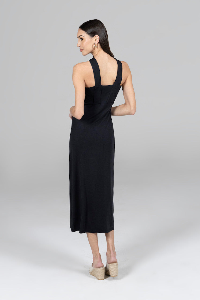 Back view of the Luxe Halter Midi Dress in black, showcasing the design and fit from the rear.