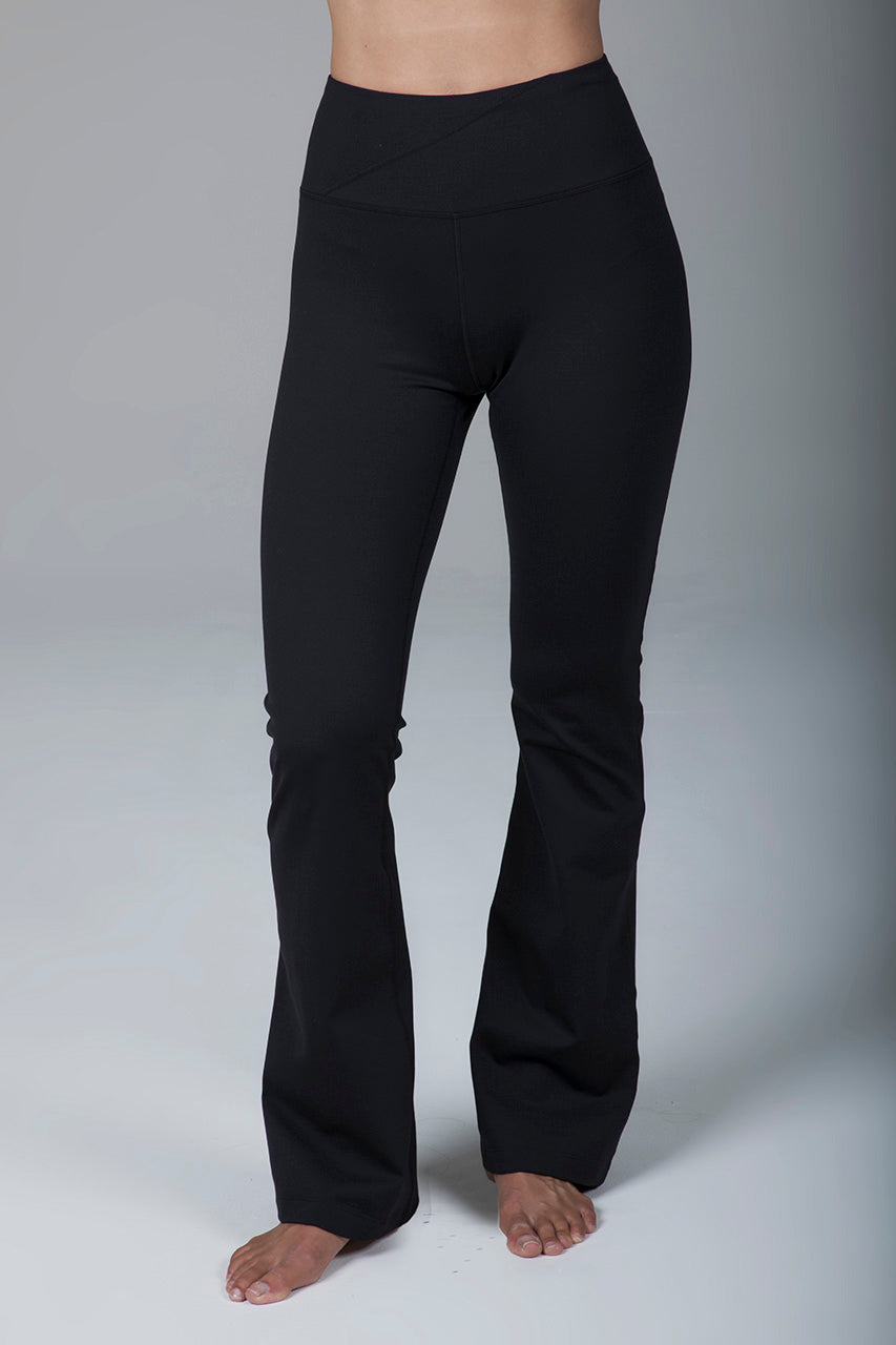 Front view of compressive black high-rise bootcut yoga leggings, showcasing their sleek design and supportive fit.